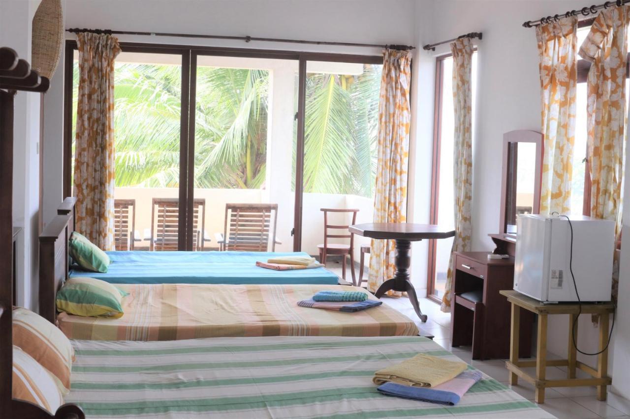 Long Beach Guest House Хиккадува Экстерьер фото